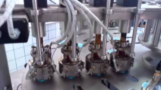 Rotary cup filling machine [upl. by Anekam]