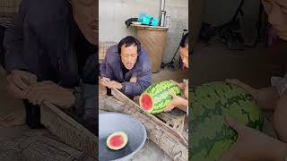 The process of cutting watermelon with steel knife [upl. by Montagu]