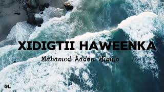 Mahamed Aadan Himilo  Xidigtii Haweenka  Hees  Lyrics [upl. by Hanikehs]