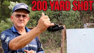 IMPOSSIBLE 200 yard snub nose revolver shot upside down one handed with pinky finger [upl. by Ogram]