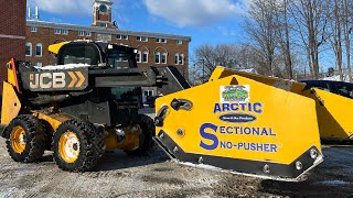 Snow plowing apartments with skid steer [upl. by Annim]