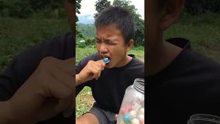 How to peel candy and eat it survivallifehacksoutdoorsshorts [upl. by Sirod]