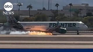 Flames erupt from Frontier Airlines plane after hard landing in Las Vegas [upl. by Warden624]