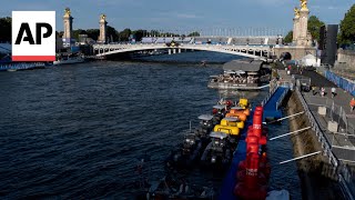 Paris 2024 director maintains confidence over Olympic triathlon swim on Seine River [upl. by Josee]