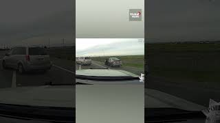 Shocking car chase Suspect clings to moving car while fleeing police [upl. by Rodman476]