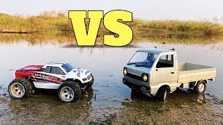 Wltoys a979 B vs WPL D12 RC Truck  RC Car 70 KMh  Wltoys RC Car [upl. by Regan730]