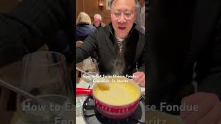 How to Eat Swiss Cheese Fondue at Engiadina Restaurant St Moritz [upl. by Eryt]