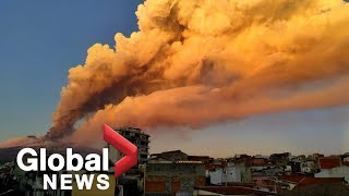 Italys Mount Etna fills sky with orange smoke after eruption [upl. by Nnywg406]