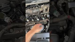 Replacing ignition coil and spark plug 2009 Nissan Altima [upl. by Todhunter]