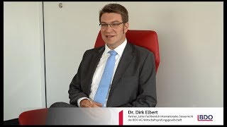 Dr Dirk Elbert Leiter Internationales Steuerrecht im Interview zur US Steuerreform [upl. by Armillia]