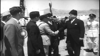 President Iskander Mirza arrives in Kabul and being greeted by King Mohammed ZahiHD Stock Footage [upl. by Cheng932]