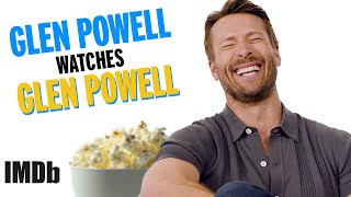 GLEN POWELL watches Glen Powell  Hit Man Interview  IMDb [upl. by Ojoj]