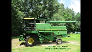 John Deere 6620 Combine Changing The Transmission Fluid [upl. by Airitac554]