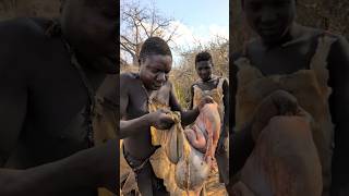 Hadza boys preparing their favorite Food for a Lunch hadzabetribe food villagelife [upl. by Robby]