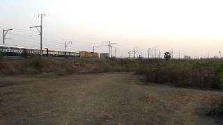 Indian Railways Pushpak Express from a different anglebetween Khadavli and Titwala [upl. by Necyrb]