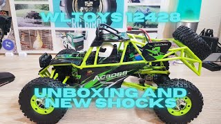 WLTOYS 12428 Unboxing and attaching Oil Filled Shocks [upl. by Arahahs]