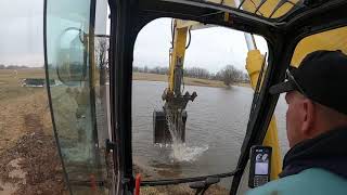 Kobelco SK210 draining the swamp [upl. by Refenej]