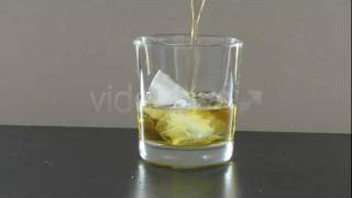 Stock Video Footage Serving Whiskey on the Rocks [upl. by Hutt]