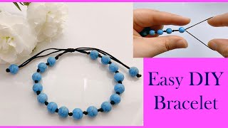 Friendship bracelet  How to make a bracelet Beads Charm Cord Thread String Good Luck Bracelet [upl. by Elam]