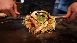 Eating Michelin Guide Okonomiyaki in Osaka Japan [upl. by Maier]