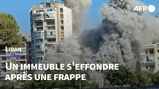 Liban un immeuble seffondre après une frappe au sud de Beyrouth  AFP Images [upl. by Llekcm306]