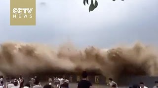 Spectacular Tidal Bore on Qiantang River Wows Viewers [upl. by Braswell]