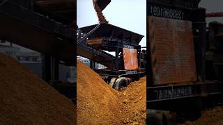 Excavator digging up rocks onto a rock sifter work machine shorts [upl. by Kuska]