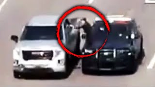 Cop Climbs Into Moving Car to Save Driver During Emergency [upl. by Oiceladni102]