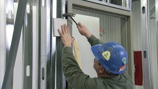 How to Install a Steel Door Frame in Steel Stud Construction  Steel Door Institute [upl. by Renfred]