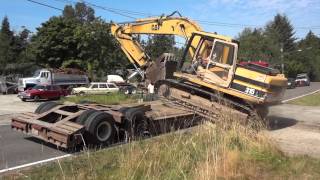 Side Loading Cat 315 Excavator Onto Peerless Lowboy [upl. by Kenon]