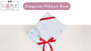 Tying diagonal ribbon bow around gift wrapping box  如何用絲帶绑禮物盒蝴蝶結 [upl. by Truitt133]