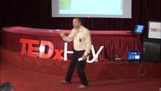 Intelligence holistique et application  Azedine BOULMAKOUL at TEDxHay [upl. by Aikehs]