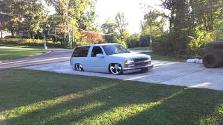 BAGGED STOCK FLOOR BODYDROPPED CHEVY TAHOE ON 24S SFBD [upl. by Thursby]