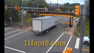 Truck hits 11foot8bridge88 and almost backs into ambulance [upl. by Ycnej]