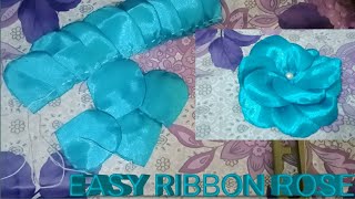 How to make a ribbon flowerRibbon roseeasy method to make a ribbon roserose making tutorial [upl. by Slosberg]