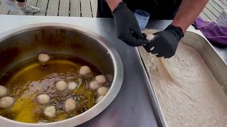 Street food delicious handmade donuts Greek Loukoumades [upl. by Atterrol]