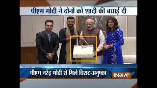 Newlyweds Virat Kohli Anushka Sharma meet PM Modi invite him for wedding reception [upl. by Colville729]