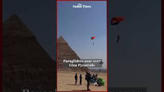 Paragliders soar over Giza Pyramids [upl. by Forelli]