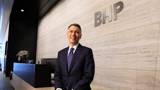 BHP slashes dividend and reports drop in underlying earnings [upl. by Edahs]