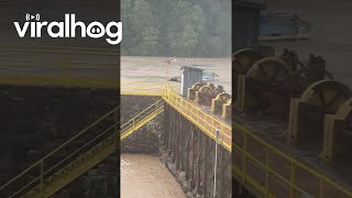 Pontoon Boat Goes Over Flooded Dam in Virginia  ViralHog [upl. by Etteoj]