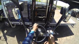 Toyota Forklift unloading Isuzu Truck [upl. by Bloomer]