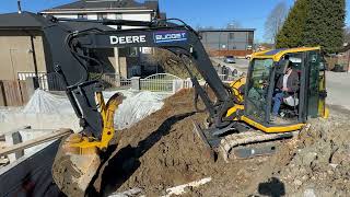 Excavator Backfilling a House Foundation [upl. by Notnyw268]