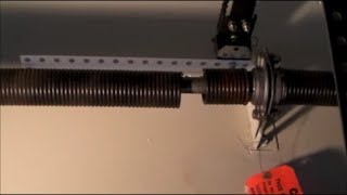 How to remove STATIONARY cone from garage door torsion spring without a vise [upl. by Aneala]