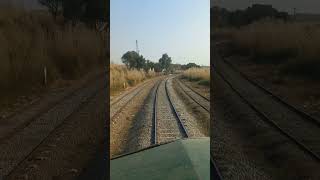 Beautiful live view of train in curve crossing Kaluwal railway station in mountains Pakistan shorts [upl. by Isoj]