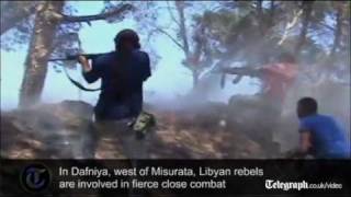 Libyan rebels attck gaddafi artillery positions as they engage in fierce combat [upl. by Inacana]