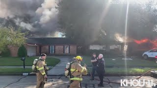 Raw video Firefighters work to put out house fire in La Porte Texas [upl. by Nosahc604]