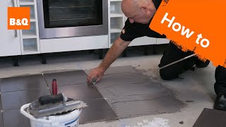 How to tile a floor part 2 laying the tiles [upl. by Odidnac]