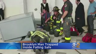 Man Trapped Inside Falling Safe In Brooklyn [upl. by Ermentrude]