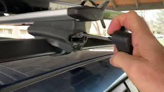 Removing Thule Roof Rack from Car [upl. by Hserus460]