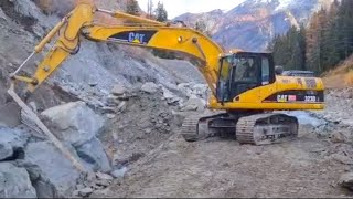 posizionamento MASSI per SCOGLIERA con escavatore CATERPILLAR 323D [upl. by Eidok]